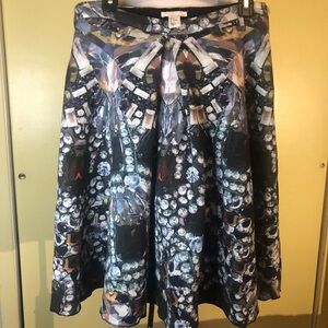 H & M Neoprene gemstone laser print skirt. Size 12. Pleated front.